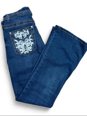 vintage low rise blue flare jeans with rhinestone embroidered pockets